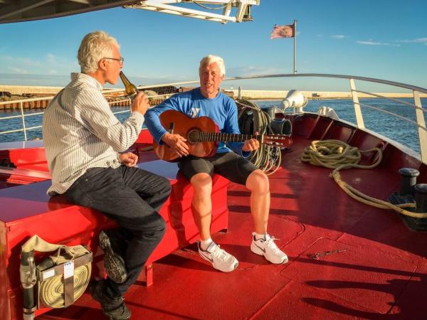 Guests enjoying the sundeck on ship Ave Maria