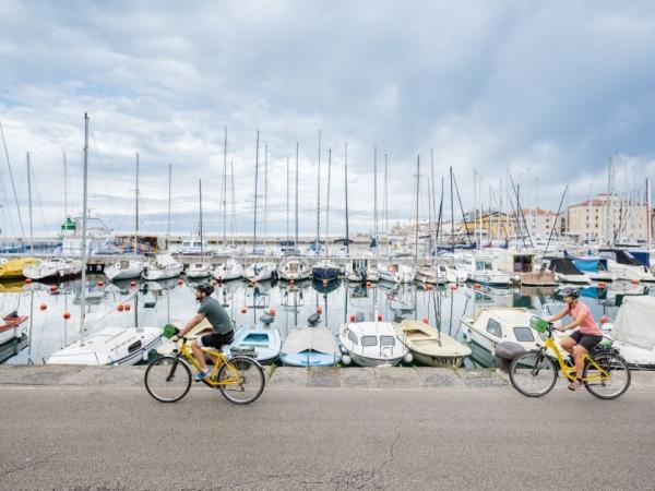 Cyclist in a coastal town 