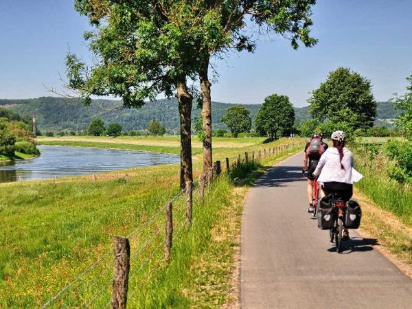 Cyclist along the Weser river