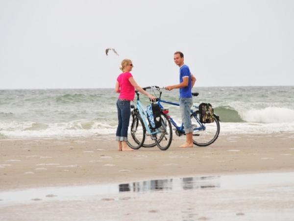 Cyclists on the beach