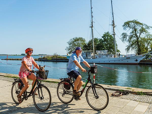 Cyclists in a harbour