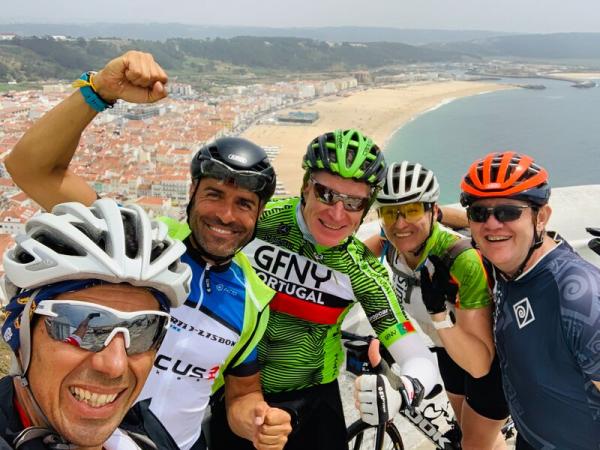 Group of cyclists over Nazar beach