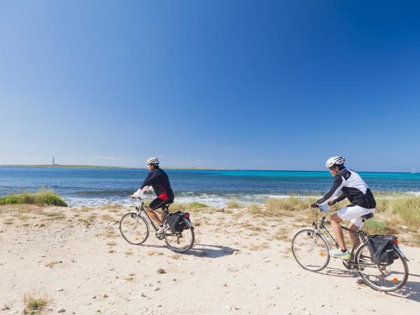 Cyclists on a beach