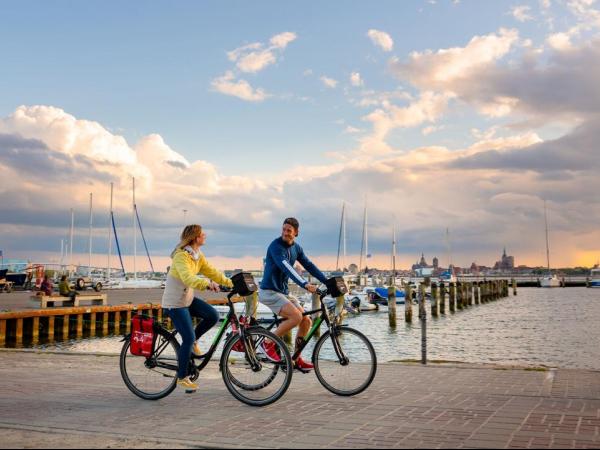 Cyclists in a harbour