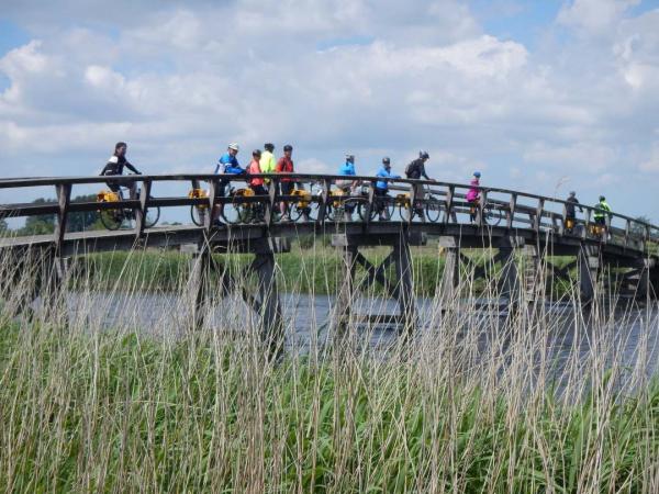 Cyclists on a bridge